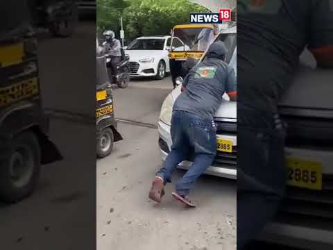 Viral | Security Marshall On A Car Bonnet Tries To Stop The Driver For Not Wearing Mask | #Shorts