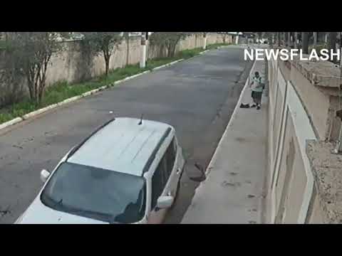 Moment SUV Driver Rams Two Thieves Robbing Couple In Street